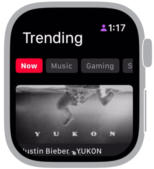Apple Watch running YTWatch, showing the Trending screen with Now, Music and Gaming category tabs above a video thumbnail